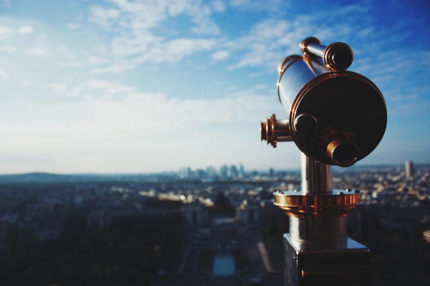 telescope-looking-out-on-city