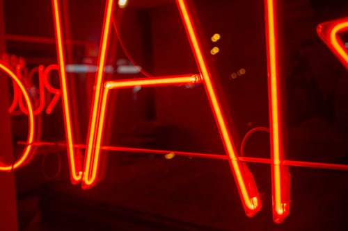 Bright orange neon sign